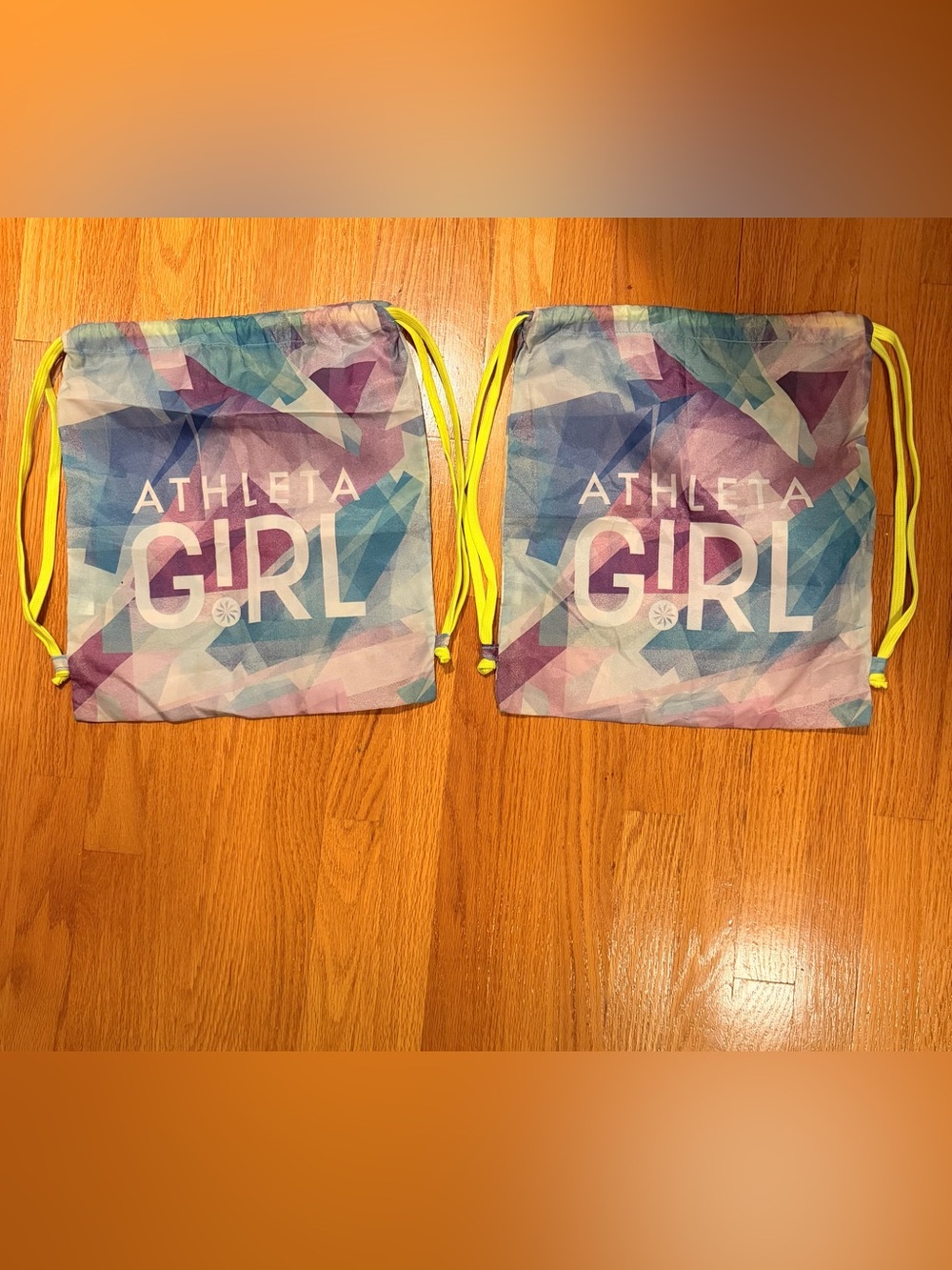 Athleta Girl Multicolor Geometric Drawstring Backpack with Neon Yellow Cords